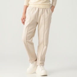 KawaiOkada 洗い加工のテーパードシルエットパンツ